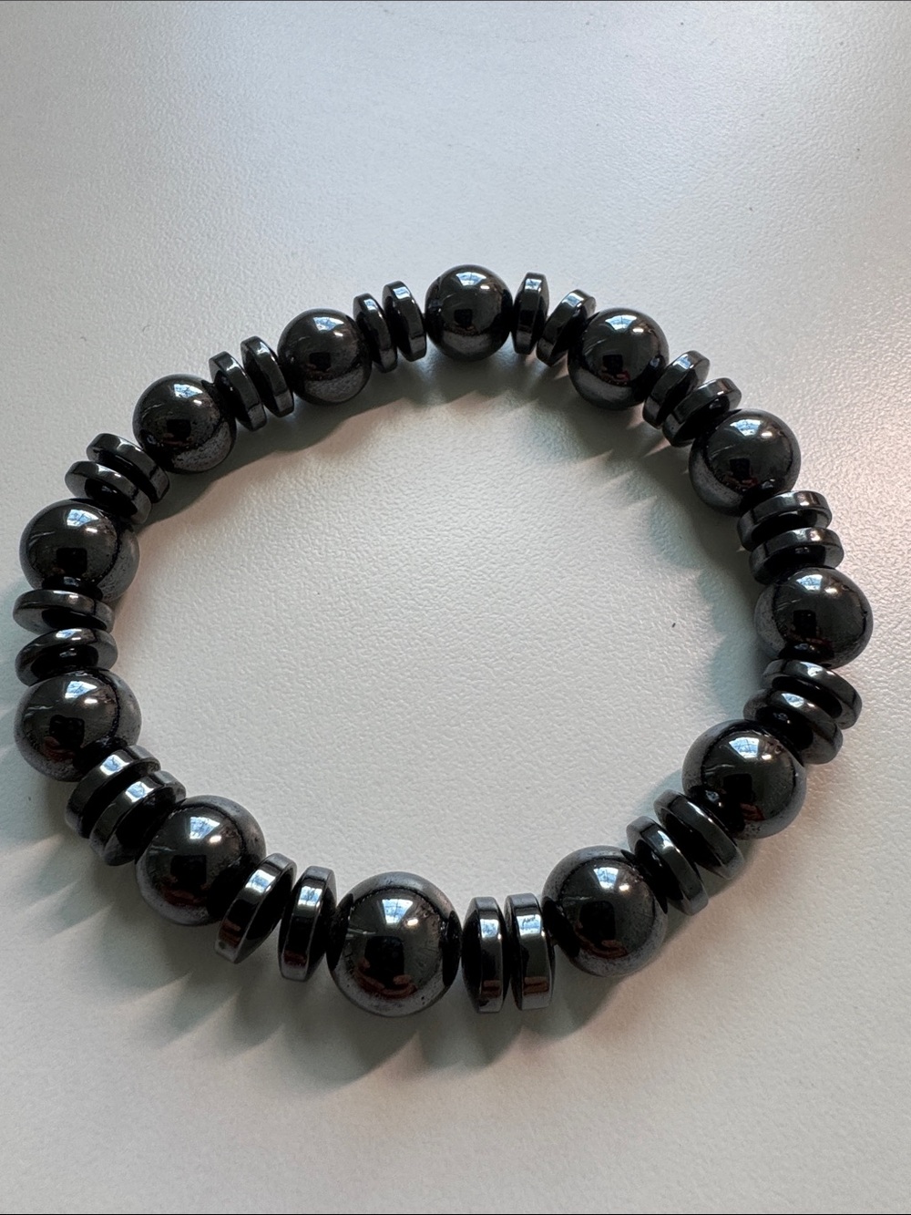 Sleek Hematite Beaded Stretch Bracelet - Glossy Black